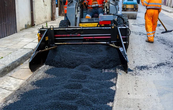 Lightl truck laying fresh bitumen and asphalt — Stock Photo, Image