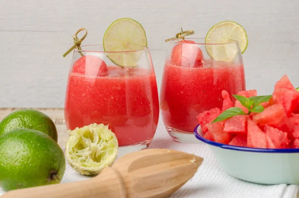 Watermelon fresh juice with mint leaves and lime citrus — Stock Photo, Image