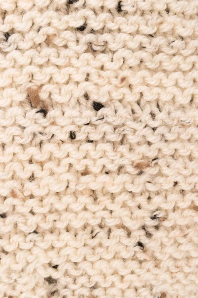 Vinter tröja Design. Bege stickning ull textur bakgrund. — Stockfoto