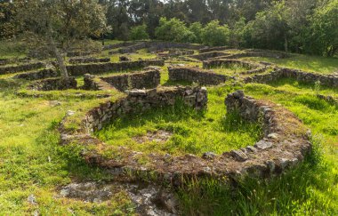 The Castro de Romariz is a fortified settlement dating from the 5th century BC, with occupancy levels up to the first century AD. Romariz - Santa Maria da Feira, Portugal. clipart