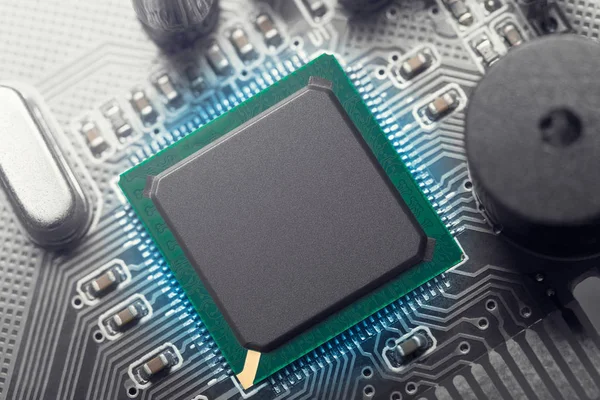 Microchip on motherboard — Stock Photo, Image