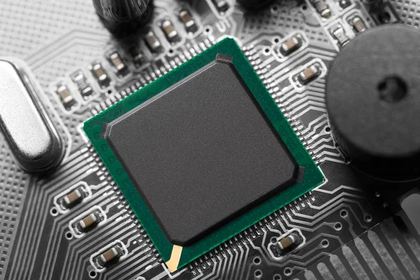 Microchip on motherboard — Stock Photo, Image