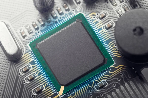 Microchip on motherboard — Stock Photo, Image