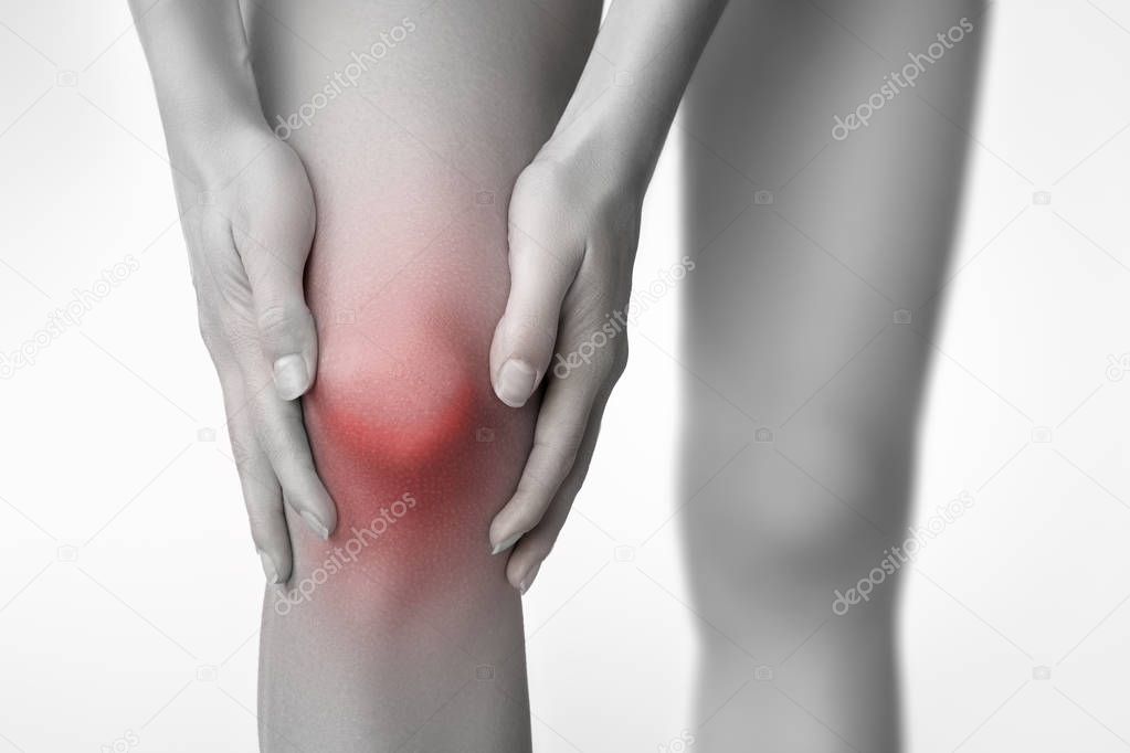 Knee pain. Women's leg painful zone.