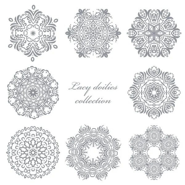 Lacy doilies set isolated on white. — Stock Vector