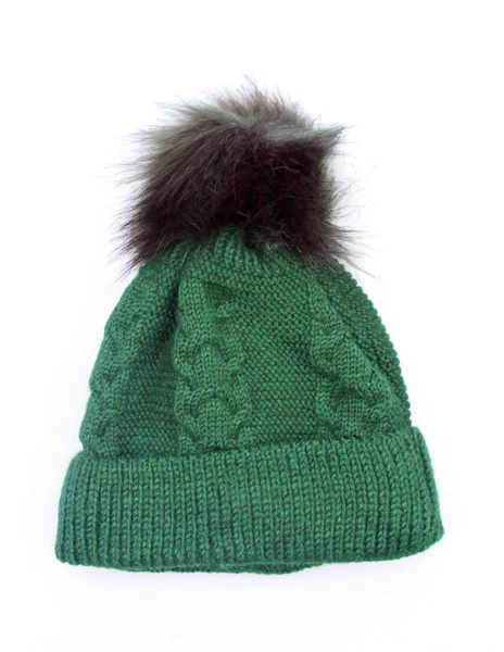 Grüne wollene Wintermütze mit Bommel und Bommel auf weißem Grund — Stockfoto