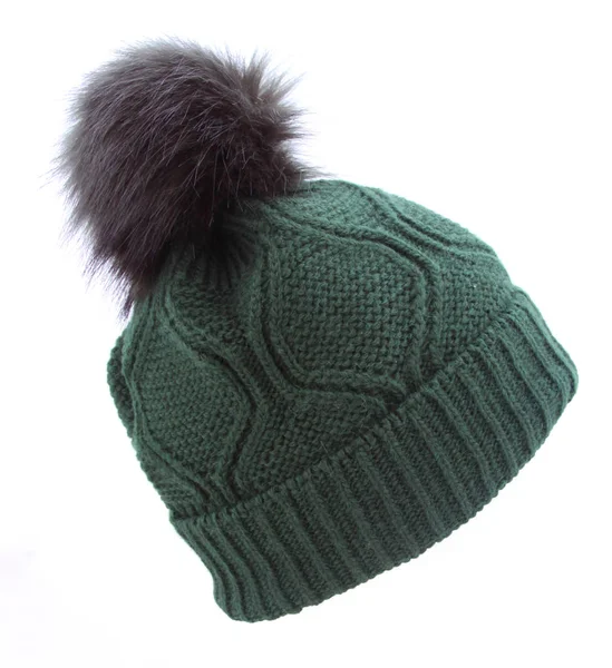 Sombrero gorra de invierno de lana verde con un pompón pompón pom aislado en blanco —  Fotos de Stock