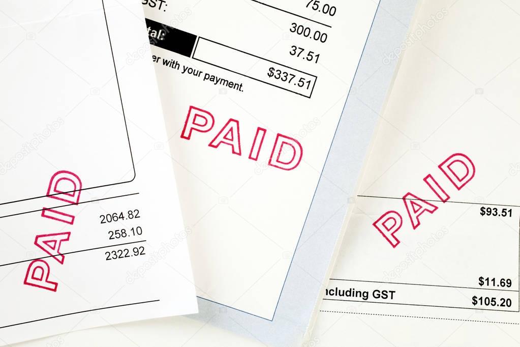Three Invoices with Paid Stamp