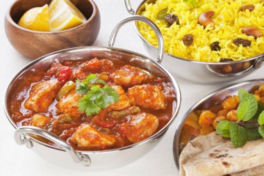 Indian Food Chicken Jalfrezi Curry and Yellow Rice Pillau clipart