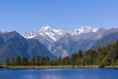 Aoraki Mount Cook and Mount Tasman from Lake Matheson clipart