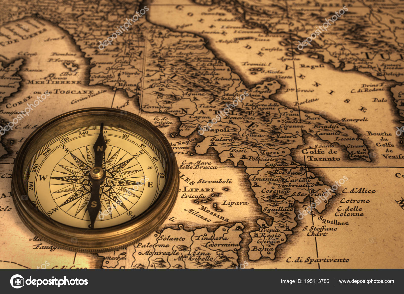 Compass and Ancient Map of Italy Stock Photo by ©TravellingLight