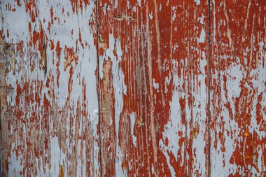 Eski ahşap duvarda boya kalıntıları var. Geçmişe dönük arkaplan yapıldıName