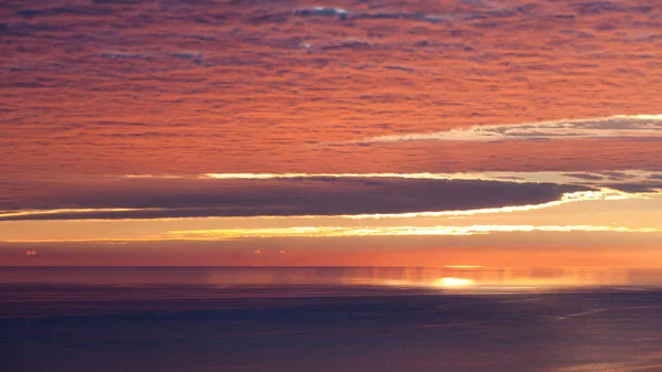 Zonsondergang Zee Stockafbeelding