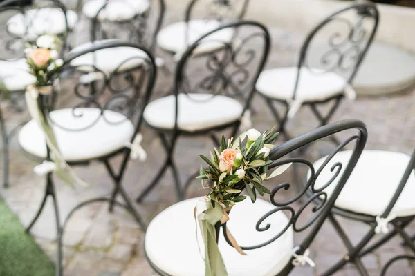 Close up of floral decorated of chairs backs