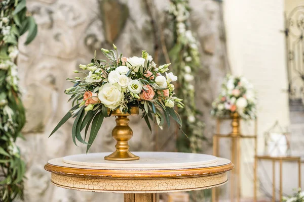 Floral wedding decoration with fresh pastel flowers on table