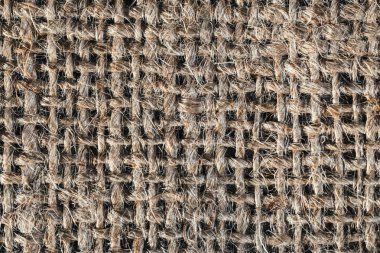 Bir kahverengi çuval bezi çanta dokulu arka plan yakın çekim