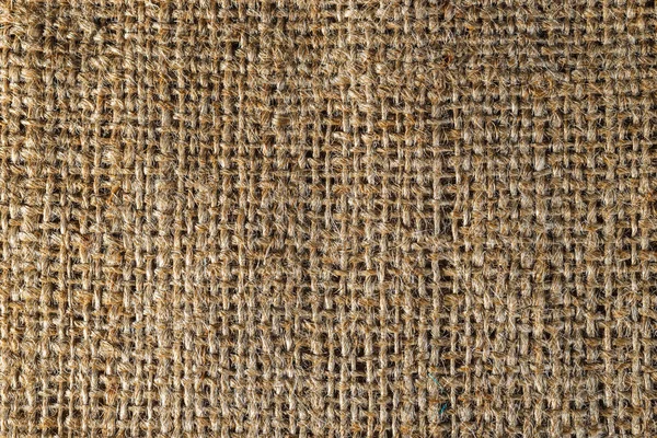 Fondo texturizado de una bolsa de arpillera marrón, primer plano — Foto de Stock