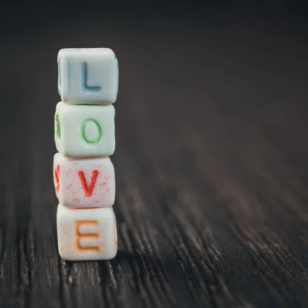 Word Love written in ceramic blocks — Stock Photo, Image