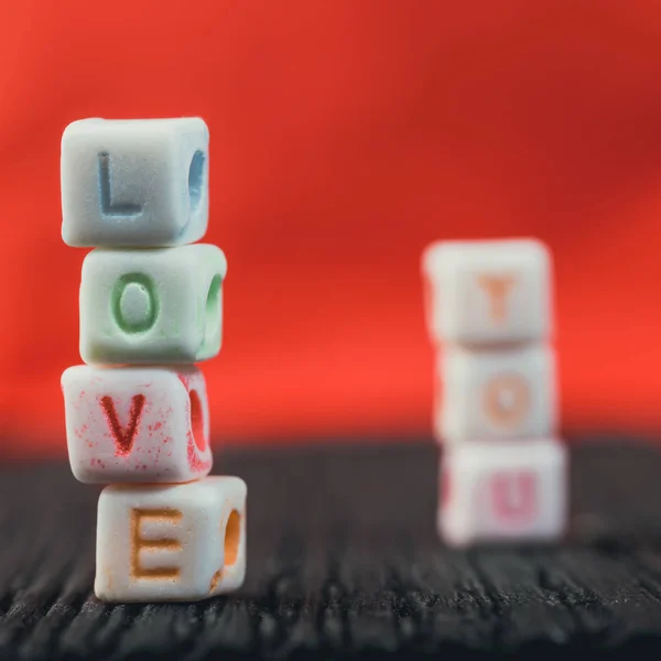 Word Love written in ceramic blocks — Stock Photo, Image