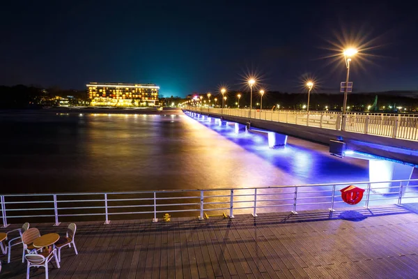 Concrete pier in Kolobrzeg, long exposure shot at sunset — Stock Photo, Image