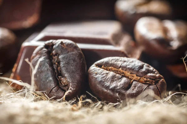 Close up of chocolate and coffee beans, shallow dof — Stock Photo, Image