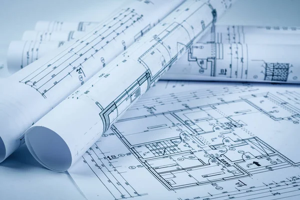 Architect rolls and house plans, close up — Stock Photo, Image