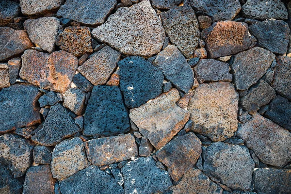 Bazalt volkanik taş duvar arka planı olarak kullanma — Stok fotoğraf