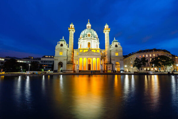 night view of famous Saint Charles's Church at Karlsplatz in Vienna, Austria