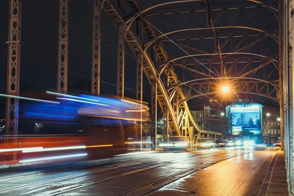 Krakow, Poland, November 12, 2017: Abstract Tram Light Trail on the Pilsudzki bridge in Krakow, Poland — Stock Photo, Image