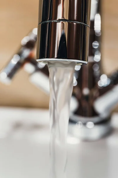Water tap with modern design in bathroom — Stock Photo, Image