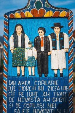 Sapanta, Romanya - 04 Temmuz 2015- Maramures'deki ünlü Şenli Mezarlığı'nda boyalı ahşap haçlar, bu mezarlık Romanya'da ve dünyada eşsizdir