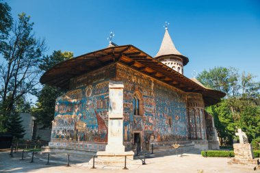 Voronet Monastery is a famous painted monastery in Romania clipart
