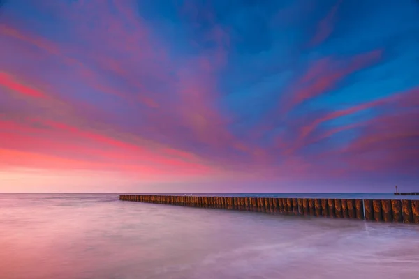 Puesta de sol en la playa, larga exposición — Foto de Stock