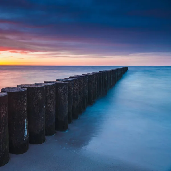 Solnedgång på stranden, lång tid exponering — Stockfoto