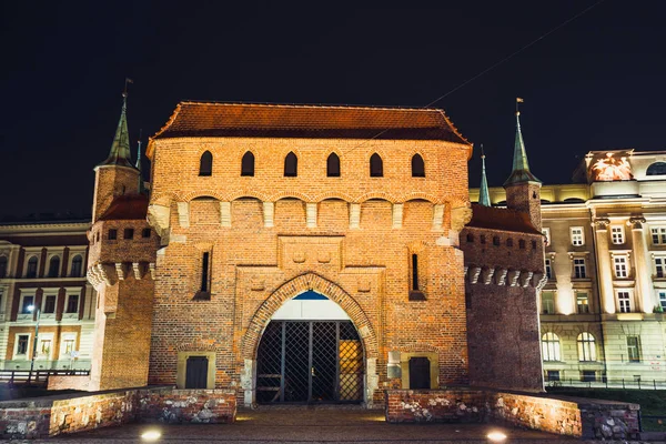 Barbican fortress in the historic center of Krakow at night, Poland — Stock Photo, Image