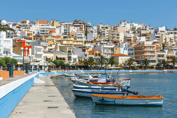 Sitia, Crete, Greece, June 11, 2917: Seaport of Sitia town with moored traditional Greek fishing boat — Stock Photo, Image