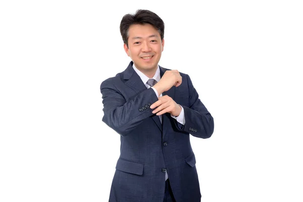 Азиатский бизнесмен средних лет делает жесты руками на белом фоне . — стоковое фото