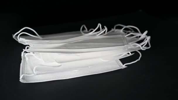 Medical Disposable Masks Stacked Black Background — Stock Video