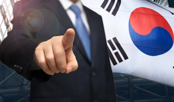 韓国選挙の概念 韓国の国旗を背景にした実業家の選挙運動 — ストック写真