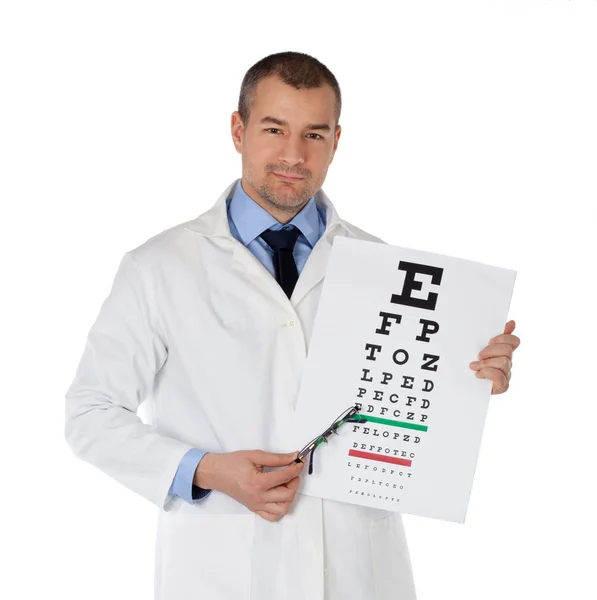 Young doctor holding glasses and eye chart. Isolated on white ba — Stock Photo, Image