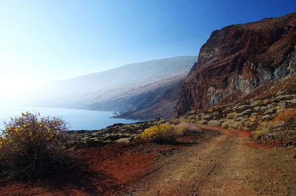 The red sand and rocks at Tacoron creek, El Hierro, Canary island, Spain — Stock Photo, Image