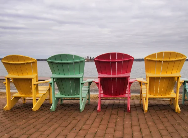 Four adirondack chairs — Stock Photo, Image