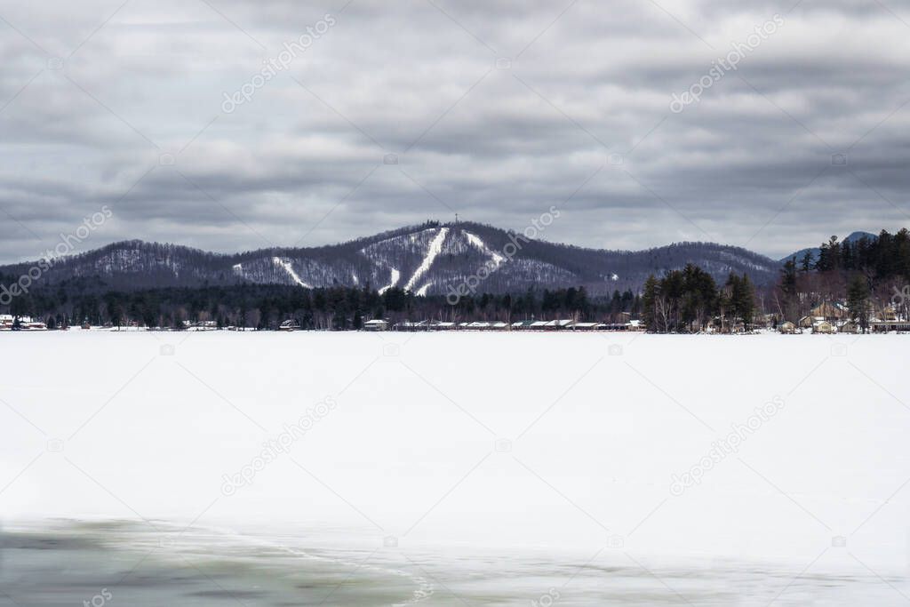 Quiet mountain landscape and frozen lake in The Adirondack Mountains of upstate New York