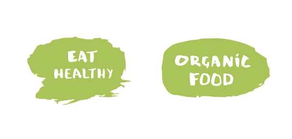 Coma alimentos saludables y orgánicos insignias dibujadas a mano. Ilustración vectorial . — Vector de stock