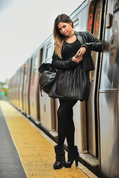 Sexy glamour woman posing at the train staion — Stock Photo, Image