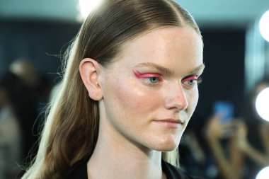 NEW YORK, NY - SEPTEMBER 08: A model posing backstage before the Custo Barcelona show during New York Fashion Week: The Shows at Pier 59 on September 8, 2018 in New York City. 