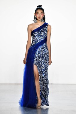 NEW YORK, NEW YORK - SEPTEMBER 05: A model walks the runway for Tadashi Shoji Spring/Summer 2020 during New York Fashion Week: The Shows at Gallery I at Spring Studios on September 05, 2019 in New York City. 