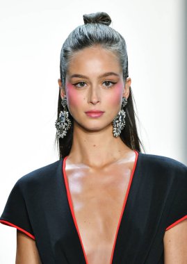 NEW YORK, NEW YORK - SEPTEMBER 05: A model walks the runway for Tadashi Shoji Spring/Summer 2020 during New York Fashion Week: The Shows at Gallery I at Spring Studios on September 05, 2019 in New York City. 