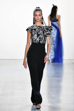 NEW YORK, NEW YORK - SEPTEMBER 05: A model walks the runway for Tadashi Shoji Spring/Summer 2020 during New York Fashion Week: The Shows at Gallery I at Spring Studios on September 05, 2019 in New York City. 