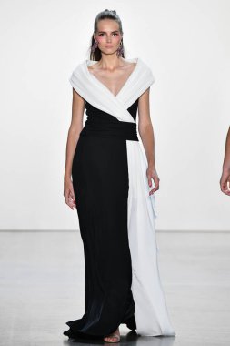 NEW YORK, NEW YORK - SEPTEMBER 05: A model walks the runway for Tadashi Shoji Spring/Summer 2020 during New York Fashion Week: The Shows at Gallery I at Spring Studios on September 05, 2019 in New York City. 